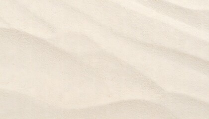 Fototapeta premium Delicate sand dunes create a textured, neutral background with subtle shadows