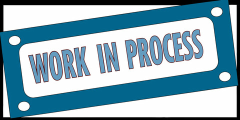 A Stylized Work In Progress Sign with Bold Blue Lettering and a Matching Border Indicating a Project is Currently Under Development or Construction
