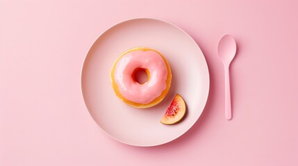 Pink Donut with Fruit and Spoon on Pink Plate
