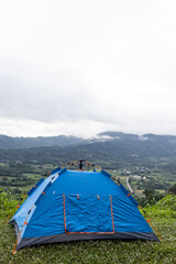 Blue tent, mountain camping, nature tourism, adventure