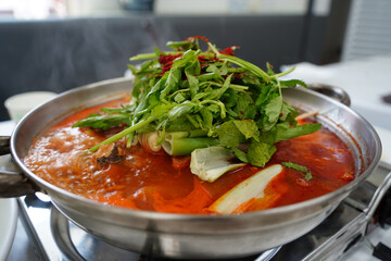 Spicy Korean Fish Stew with Mugwort and Chili Powder
