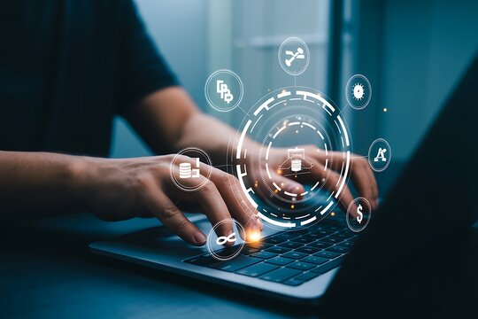 Person typing on laptop with digital financial icons and data visualization hands technology
