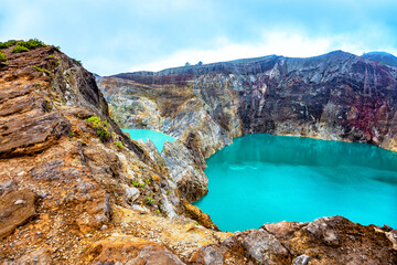 Crater lakes Danau Alapola and Kootainuamuri, Volcano Kelimutu, Island Flores, Indonesia, Southeast Asia.