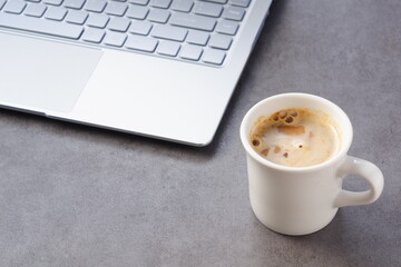 Laptop with cup of coffee
