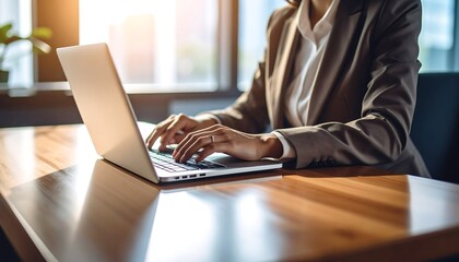 Businesswoman working on laptop