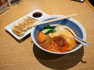 Tan Tan Ramen a spicy tasty Japanese ramen noodle soup and Gyoza a Japanese and Chinese fried...