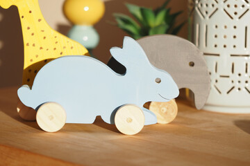 Wooden toy animals on display in bright interior setting