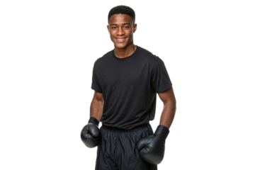 Portrait of a smiling young boxer in black sportswear and gloves, showing confidence and strength, isolated on white background