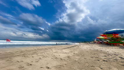 Beach holiday scene at Legian Beach in Bali