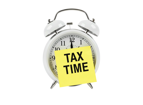 alarm clock with  sticky note saying tax time isolated on transparent background