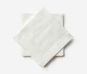 Two pristine white paper napkins, neatly stacked, displayed against a clean white backdrop; exhibiting a subtly textured surface and slightly creased edges