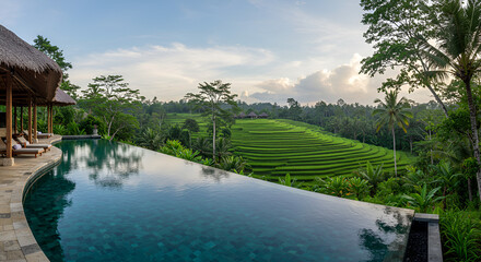 Lush infinity pool overlooking a rice terrace landscape