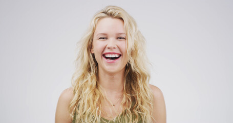 Portrait, woman and laughing in studio for comedy, funny joke and reaction to meme. Happy, female...