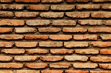 Background, texture, brick wall made of narrow old bricks