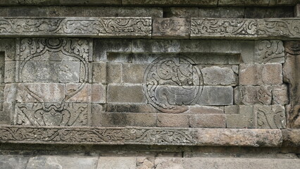ancient relief on a stone wall