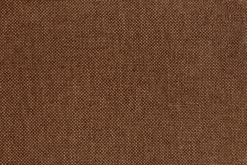 Dark brown fabric cloth texture for background, natural textile pattern.