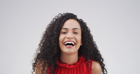 Portrait, smile and woman laughing in studio with expression, funny joke and reaction to meme....
