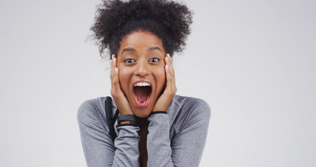 Excited woman, portrait or surprise with emotion for winning in studio on a white background....