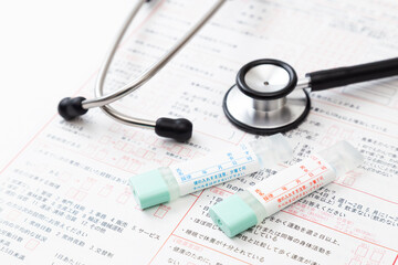 聴診器と問診票と検便キット