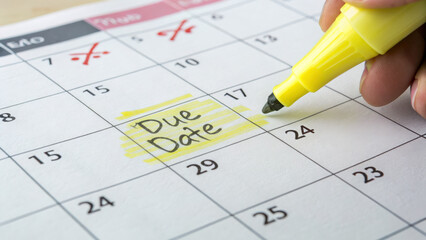 Due date marked on calendar with highlighter, emphasizing important deadline