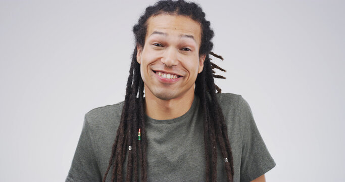 Portrait, happy and creative man in studio as confident copywriter for business. Worker, dreadlocks and smile for pride with African person or content writer on white background with space in Kenya