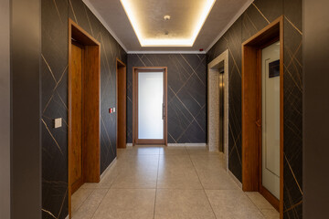 Interior of a hotel hallway with many doors