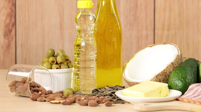 Assorted Healthy Fats and Oils on Wooden Table