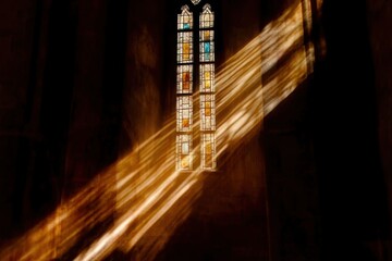 Sunlight streaming through stained glass in a minimalistic design