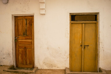 Two Colorful Doors Side by Side — Red and Yellow