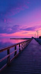 Obraz premium Sunrise pier, vibrant colors, calm sea