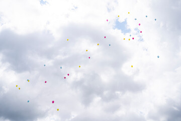 Colorful balloons floating in the sky. Concept: celebration, freedom, joy, lightness, uplifting...