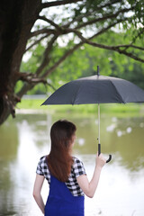 Young girl in a green park