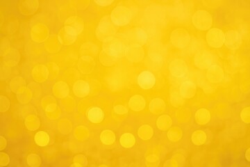 Soft yellow background with circular bokeh and shimmering light effects for a festive abstract scene