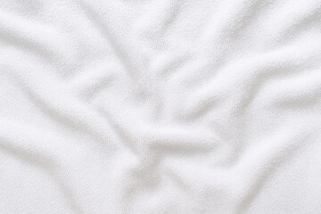Obraz premium Texture of a white towel with wrinkle details
