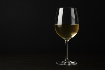 Elegant wine glass showcased against a dark backdrop