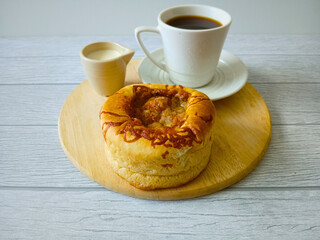 bread and coffee on table