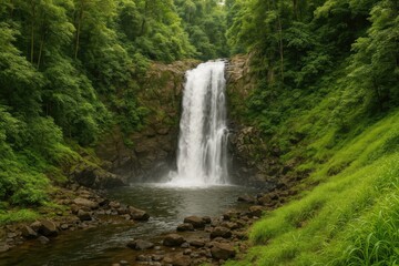 Majestic cascade amidst lush greenery in a jungle setting