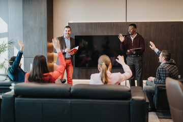 A team of business individuals engaged in a professional meeting held in a modern office,...