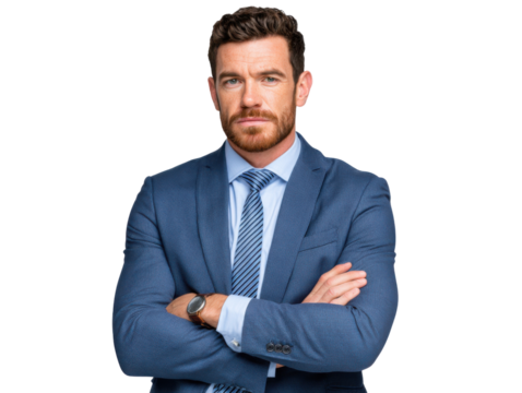 Focused Executive: An impeccably dressed executive, displaying an air of confidence, poses with arms crossed. The photograph captures the professional essence.