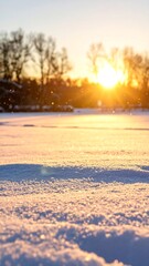 Winter sunset over snow-covered landscape