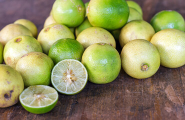 Lime halved on a wooden table