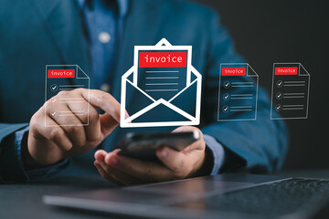 E-Invoice and Digital billing concept, Businessman using smartphone to manage electronic statements on virtual screen. E-tax, Digital receipt, Online invoice processing and tax accounting solutions.