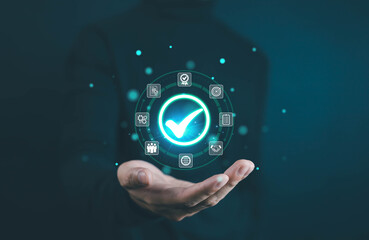 Businessman holding quality certification mark, audit, business, assurance, control, digital, service, complete, assessment, checklist, data with quality icon.