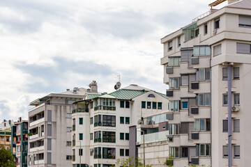  Contemporary urban living: modern apartment buildings under cloudy sky in cityscape. Sept. 19, 2024. Podgorica, Montenegro