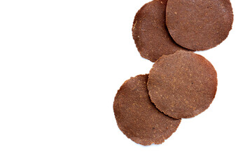 Fermented soybean discs, known as “Thua Nao,” a traditional Thai seasoning used to enhance flavor in Northern cuisine.