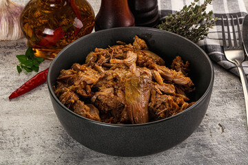 Shredded slow cooked pork meat