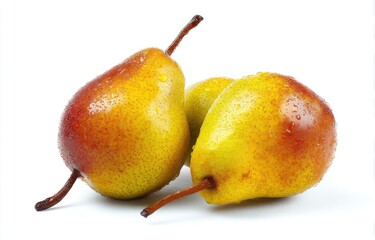 Two ripe, yellow-red pears with water droplets, nestled together on a stark white background