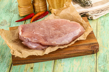 Raw turkey breast fillet piece