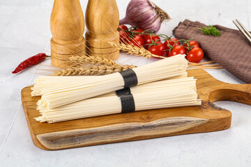 Raw dry white wheat noodles