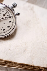 copy space, Clock time stop watch ticking on a 5 seconds. antique  Mechanical stopwatch Half of Clock dial close-up isolated. vintage textured paper  background, Antique Wristwatch Macro Closed